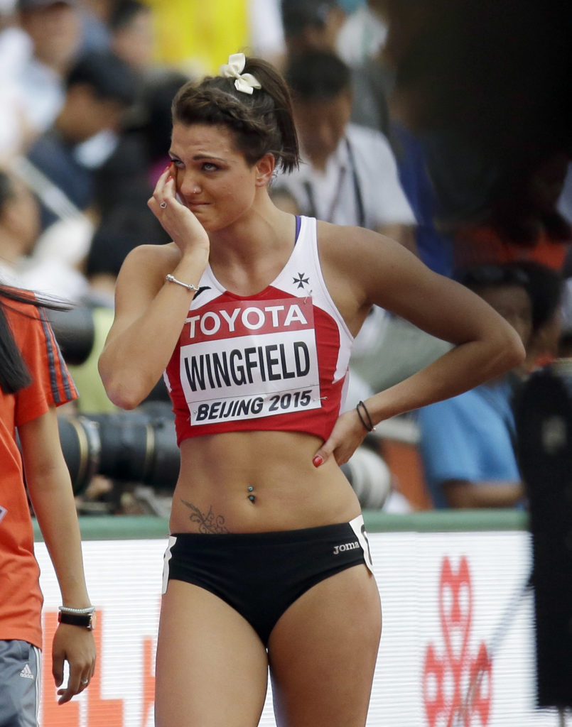 Malta's Charlotte Wingfield pauses after womens 100m round one at the World Athletics Championships at the Bird's Nest stadium in Beijing, Sunday, Aug. 23, 2015. (AP Photo/David J. Phillip)